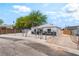 Single-story home featuring a fenced yard and convenient driveway parking at 915 Melrose Dr, Las Vegas, NV 89101