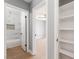 Hallway view showing access to bathroom, bedroom, and built in shelving unit at 915 Melrose Dr, Las Vegas, NV 89101