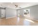 Open-concept living room with a view of the front yard and light colored flooring at 915 Melrose Dr, Las Vegas, NV 89101