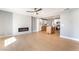 Spacious living room with electric fireplace and open layout to the kitchen at 915 Melrose Dr, Las Vegas, NV 89101