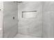 Beautifully tiled shower with geometric pattern and modern showerhead at 915 Melrose Dr, Las Vegas, NV 89101