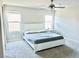 Bedroom with two windows and neutral colored walls and carpet at 9648 Spyglass Run Ave, Las Vegas, NV 89178