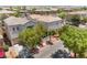 Aerial view showcasing the home's landscaping and position in a quiet neighborhood setting at 10164 Village Breeze Pl, Las Vegas, NV 89183