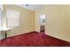 Bright bedroom with a view of the bathroom through a doorway at 10164 Village Breeze Pl, Las Vegas, NV 89183