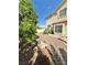 Backyard features a desert landscape with rocks and greenery at 10500 Horseshoe Falls Ct, Las Vegas, NV 89144
