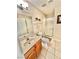Bathroom with a single sink, framed mirror, and walk-in shower with sliding glass doors at 10500 Horseshoe Falls Ct, Las Vegas, NV 89144