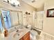 Bathroom featuring a single sink, framed mirror, and walk-in shower with glass doors at 10500 Horseshoe Falls Ct, Las Vegas, NV 89144