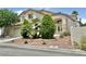 Well-maintained home with a landscaped front yard and tile roof at 10500 Horseshoe Falls Ct, Las Vegas, NV 89144