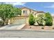 Charming two-story home with manicured landscaping and a two-car garage at 10500 Horseshoe Falls Ct, Las Vegas, NV 89144