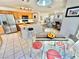 Spacious eat-in kitchen flows into the cozy living room with fireplace, perfect for entertaining at 10500 Horseshoe Falls Ct, Las Vegas, NV 89144