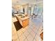 Kitchen island with a view of the living room and dining area offering natural light at 10500 Horseshoe Falls Ct, Las Vegas, NV 89144