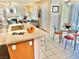 Kitchen island with a view of the living room, dining area, and windows providing lots of natural light at 10500 Horseshoe Falls Ct, Las Vegas, NV 89144