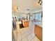 Bright eat-in kitchen with a large island, tile flooring, and stainless steel appliances at 10500 Horseshoe Falls Ct, Las Vegas, NV 89144
