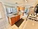View of the kitchen with an island, gas stove, and tile flooring at 10500 Horseshoe Falls Ct, Las Vegas, NV 89144