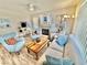 Inviting living room with a cozy fireplace, modern furniture, and bright natural light at 10500 Horseshoe Falls Ct, Las Vegas, NV 89144
