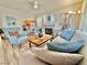 Cozy living room with comfortable seating, fireplace, and neutral tones at 10500 Horseshoe Falls Ct, Las Vegas, NV 89144