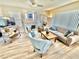 Inviting living room with fireplace and lots of natural light at 10500 Horseshoe Falls Ct, Las Vegas, NV 89144