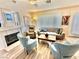 Cozy living room featuring a fireplace and lots of natural light at 10500 Horseshoe Falls Ct, Las Vegas, NV 89144
