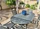 Outdoor patio features a table and chairs for relaxing and entertaining at 10500 Horseshoe Falls Ct, Las Vegas, NV 89144