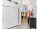 Bright foyer featuring high ceilings, decorative lighting, and a view of the front door at 110 Eagleview Ct, Henderson, NV 89074