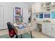 Comfortable home office featuring ample storage and a functional desk area for work and study at 110 Eagleview Ct, Henderson, NV 89074