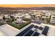 Modern home with solar panels and rooftop deck in a lakeside community at 12 Desert Lake Ln, Henderson, NV 89011