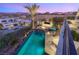 Spacious backyard features a pool, spa, and outdoor seating, all set against a picturesque desert backdrop at 12 Desert Lake Ln, Henderson, NV 89011