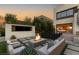 Beautiful backyard with a modern fire pit, outdoor seating, and direct access to the luxurious primary suite at 12 Desert Lake Ln, Henderson, NV 89011