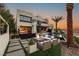 Resort-style backyard with a fire pit, seating area, pool and mountain views at 12 Desert Lake Ln, Henderson, NV 89011
