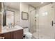 Bathroom boasts sleek glass shower enclosure, modern fixtures, and updated vanity at 12 Desert Lake Ln, Henderson, NV 89011