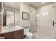 Modern bathroom featuring a glass-enclosed shower, sleek vanity, and contemporary fixtures at 12 Desert Lake Ln, Henderson, NV 89011