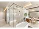Modern bathroom featuring a glass shower, dual shower heads, and sleek finishes at 12 Desert Lake Ln, Henderson, NV 89011