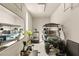 Home gym with exercise equipment and a golf cart for an active lifestyle at 12 Desert Lake Ln, Henderson, NV 89011