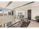 Bright hallway with steel railing, recessed lighting and views of the mountains, with indoor plants at 12 Desert Lake Ln, Henderson, NV 89011