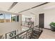 Second-floor hallway with railing and view of a game room, featuring modern architectural details at 12 Desert Lake Ln, Henderson, NV 89011