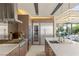 Well-equipped kitchen with stainless steel appliances, custom cabinetry, and an open design at 12 Desert Lake Ln, Henderson, NV 89011