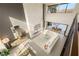 Bright, modern living room with large windows and open floor plan provides great views and natural light at 12 Desert Lake Ln, Henderson, NV 89011