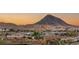 Picturesque neighborhood view featuring mountain landscapes, modern homes, and lush greenery at 12 Desert Lake Ln, Henderson, NV 89011