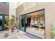 Modern office space with large windows and natural light, with outdoor access to a small courtyard at 12 Desert Lake Ln, Henderson, NV 89011