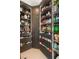 Well-organized walk-in pantry with custom shelving, drawers, and ample storage space at 12 Desert Lake Ln, Henderson, NV 89011