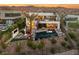 Stunning modern home with a beautiful pool, patio, and lush landscaping at 12 Desert Lake Ln, Henderson, NV 89011