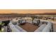 Enjoy amazing views from this rooftop deck featuring modern outdoor seating and sleek black railings at 12 Desert Lake Ln, Henderson, NV 89011