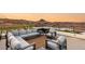 This spacious rooftop patio boasts stylish seating and stunning views of surrounding scenery at 12 Desert Lake Ln, Henderson, NV 89011