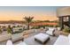 Enjoy city vistas from this lovely rooftop patio, complete with cushioned seating at 12 Desert Lake Ln, Henderson, NV 89011