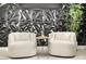 Close up of a modern home office featuring contemporary decor, sleek lighting, and chic furniture at 12039 Rockview Point St, Las Vegas, NV 89138