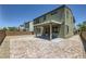 Inviting backyard with a covered patio, perfect for outdoor entertaining and relaxation at 1213 Granite Falls Pl, North Las Vegas, NV 89084