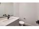 Modern powder room with sleek vanity, matte black fixtures, and contemporary finishes at 1213 Granite Falls Pl, North Las Vegas, NV 89084