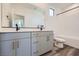 Modern bathroom features a double vanity with sleek faucets and a bathtub at 1213 Granite Falls Pl, North Las Vegas, NV 89084