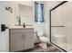 Well-lit bathroom showcasing a sleek vanity, modern fixtures, and a glass-enclosed shower at 1213 Granite Falls Pl, North Las Vegas, NV 89084