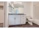 Bathroom featuring a granite countertop vanity with dual mirrors and a shower-tub combination at 12282 Azure Gate Rd # 4, Las Vegas, NV 89183